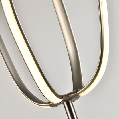 LED-Stehlampe Nahansicht: gebogener Rahmen mit warm leuchtendem LED-Streifen