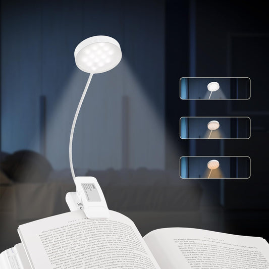 Weiße LED-Buchklemmlampe mit flexibler Halterung und Lichtkopf am geöffneten Buch