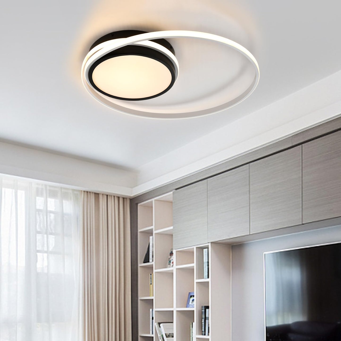 Runde LED-Deckenleuchte mit schwarzem Innenring und weißem Rahmen, warmweißes Licht