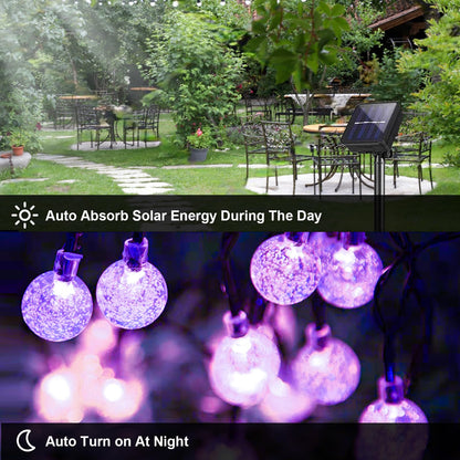 Solar-Lichterkette mit violetten Glaskugeln, Solarpanel an der Kabelkette