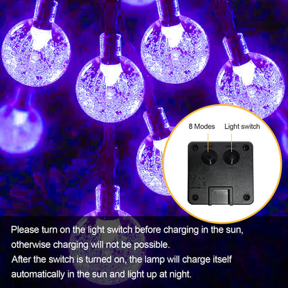 Solar-Lichterkette mit violetten Glaskugeln und Lichtschalter-Box