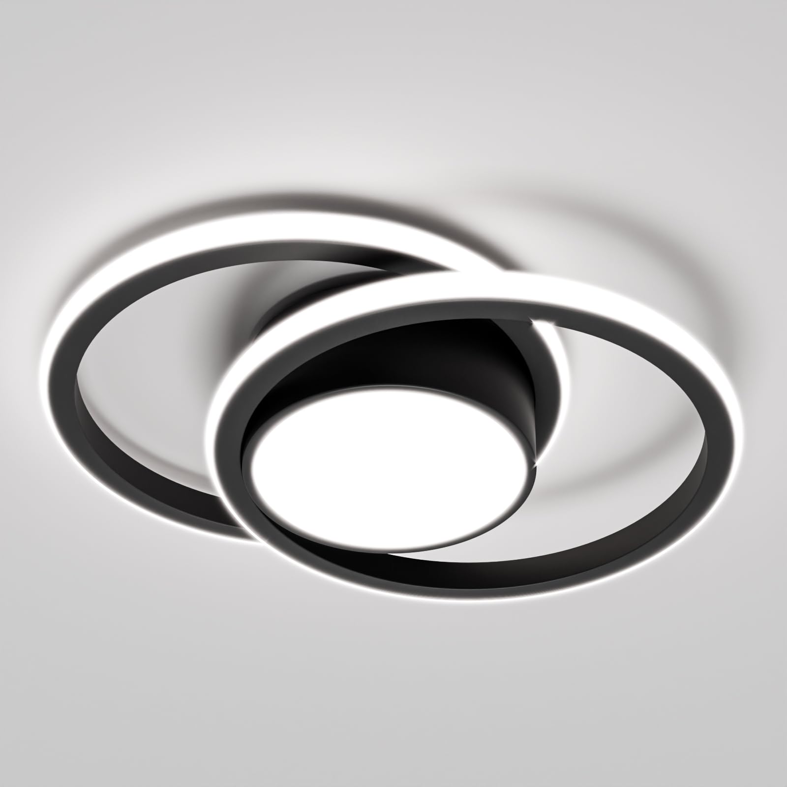 Moderne LED-Deckenleuchte mit zwei Ringen, weißem Innenring und dunklem Metallrahmen