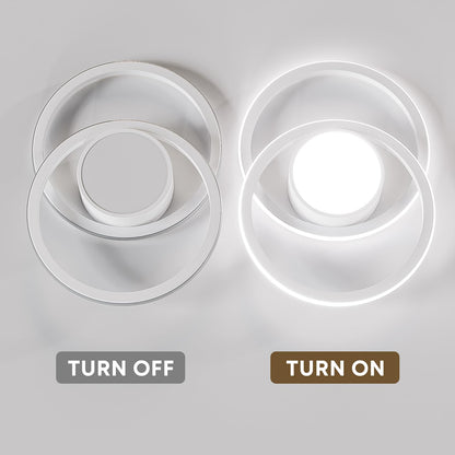 LED-Deckenleuchte mit zwei Ringöffnungen, links aus, rechts beleuchtet, weißer Rahmen