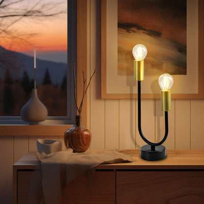 Zweiflammige Tischlampe mit goldfarbenen Lampenfassungen und schwarzem Metallgestell