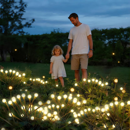 Solar-Gartenleuchten mit warmweißen 6er LED-Glühwürmchenlichtern im Gras