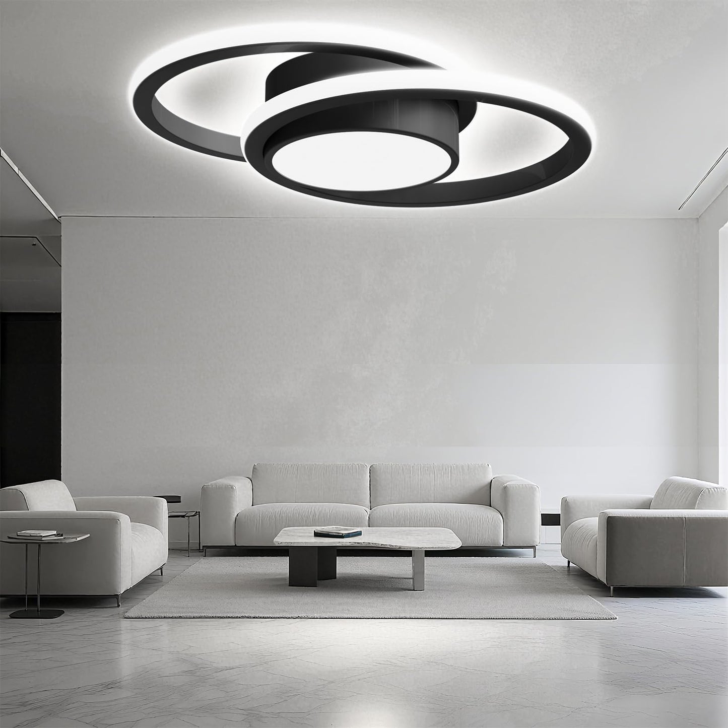 LED-Deckenleuchte mit zwei schwarzen Ringen und mittlerem Lichtkreis aus Metall und Acryl