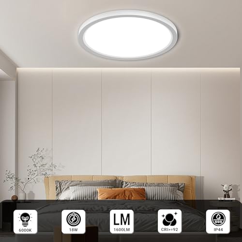 Zwei runde flache LED-Deckenleuchten mit weißem Rahmen im Deckenaufbau