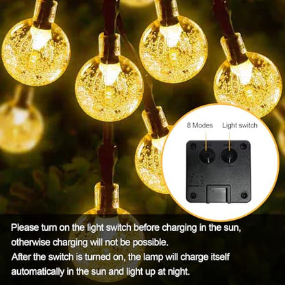 Solar-Lichterkette mit warmweißen Kugeln und IP65-Label, wetterfest für außen